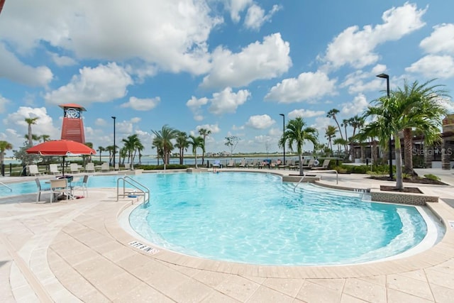 community pool featuring a patio area