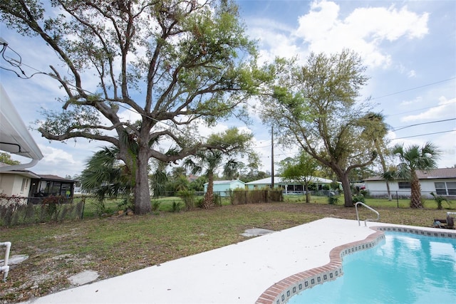 view of swimming pool featuring a fenced backyard and a fenced in pool