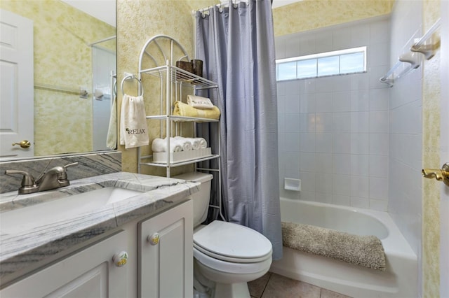 full bathroom with wallpapered walls, shower / bathtub combination with curtain, toilet, vanity, and tile patterned floors