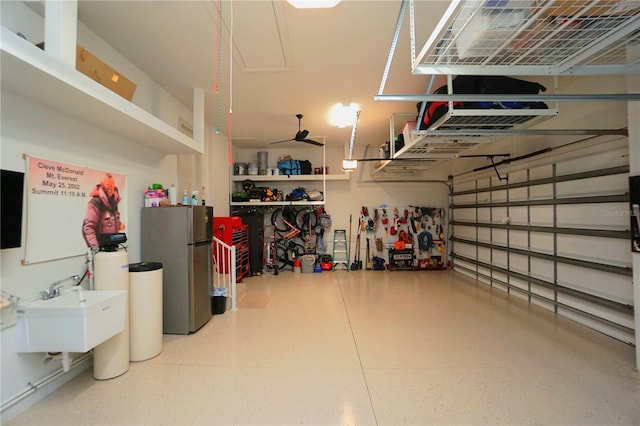 garage with freestanding refrigerator