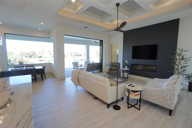 living room featuring recessed lighting, coffered ceiling, beamed ceiling, and wood finished floors