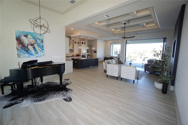 interior space with coffered ceiling, ornamental molding, light wood-style floors, beam ceiling, and recessed lighting