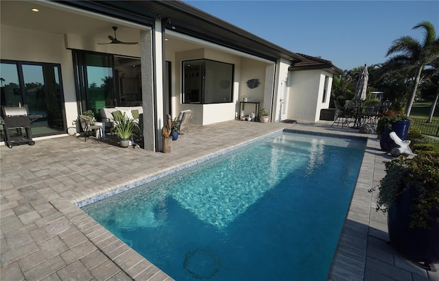 outdoor pool featuring a patio area