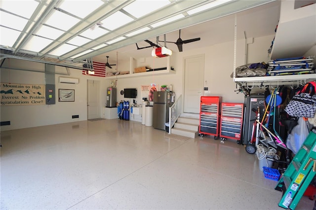 garage featuring a ceiling fan, electric water heater, and a garage door opener