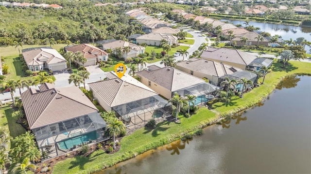 aerial view featuring a water view and a residential view