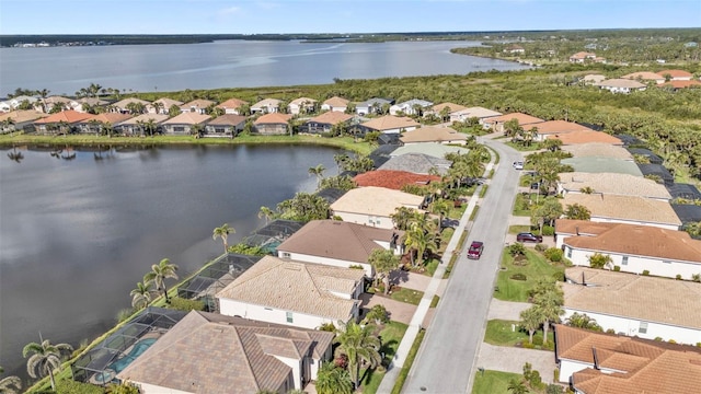 aerial view featuring a water view and a residential view