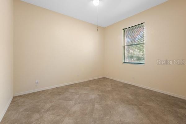 empty room with baseboards