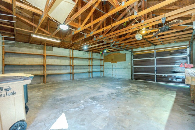 garage featuring concrete block wall