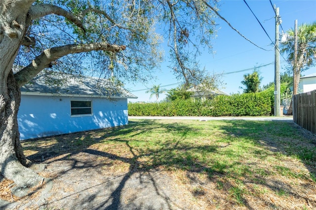 view of yard with fence