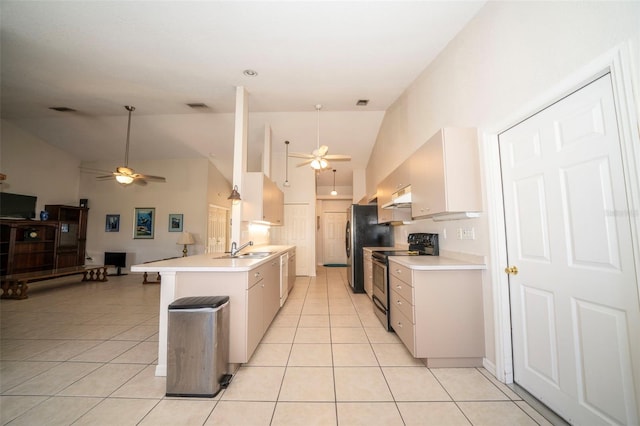 kitchen featuring light tile patterned floors, stainless steel appliances, light countertops, visible vents, and a sink