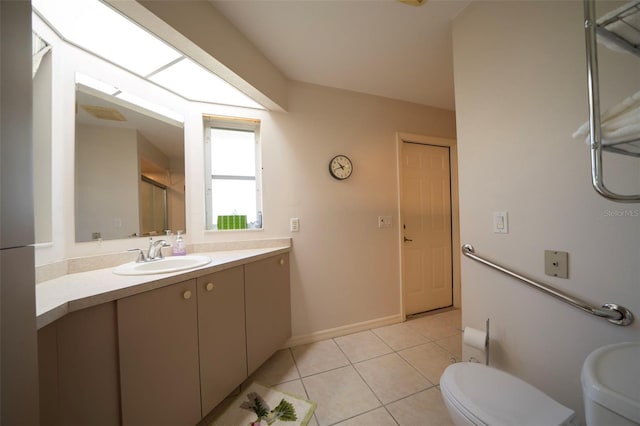 full bath with toilet, an enclosed shower, vanity, baseboards, and tile patterned floors