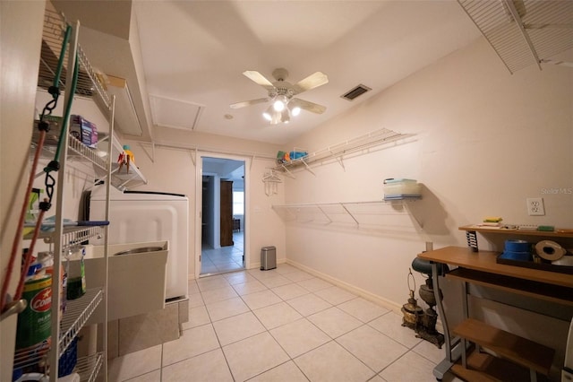 interior space featuring laundry area, attic access, washer / dryer, visible vents, and light tile patterned flooring