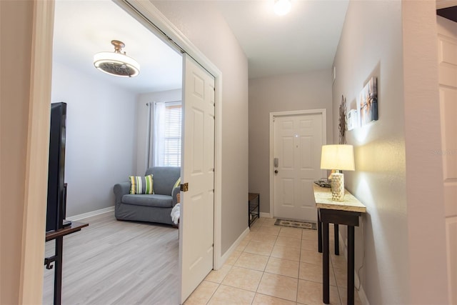 2002 Bal Harbor Blvd Unit 311, Punta Gorda, FL 33950 - corridor with baseboards and light tile patterned floors