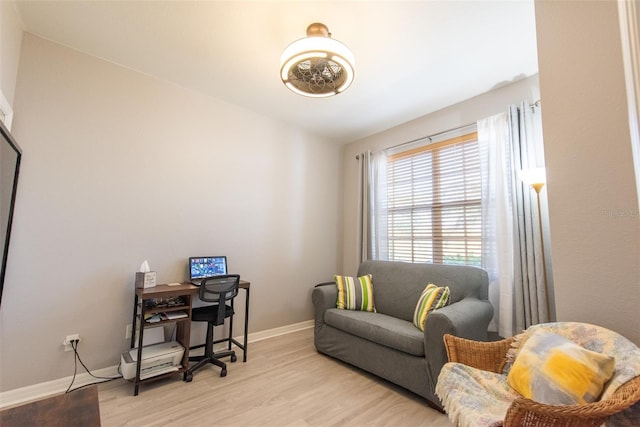 2002 Bal Harbor Blvd Unit 311, Punta Gorda, FL 33950 - home office with light wood-style flooring and baseboards
