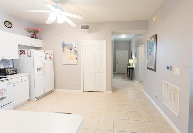 2002 Bal Harbor Blvd Unit 311, Punta Gorda, FL 33950 - kitchen featuring visible vents, white refrigerator with ice dispenser, ceiling fan, and electric range
