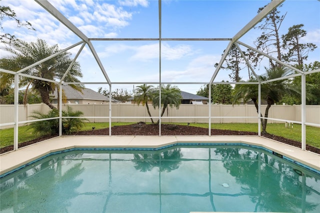 view of swimming pool with a fenced in pool, a lanai, and a fenced backyard