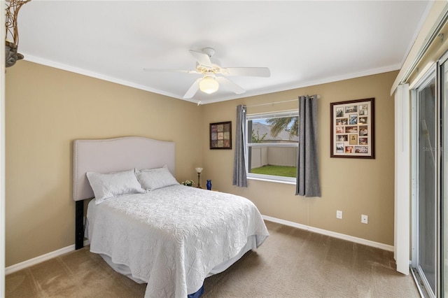 carpeted bedroom featuring baseboards and ceiling fan