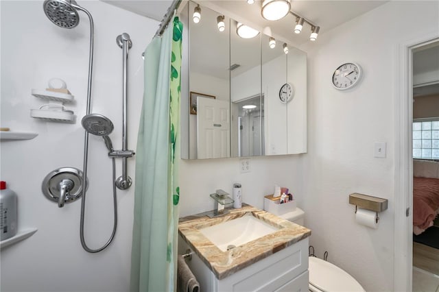 bathroom with connected bathroom, toilet, a shower with shower curtain, visible vents, and vanity