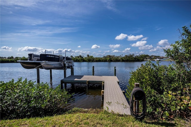 view of dock with a water view and boat lift