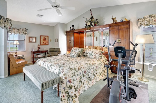 carpeted bedroom with a ceiling fan, lofted ceiling, visible vents, and baseboards