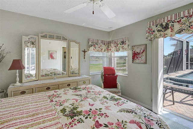 bedroom featuring carpet floors, access to exterior, baseboards, and a ceiling fan