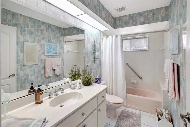 full bathroom with wallpapered walls, visible vents, shower / tub combo with curtain, tile patterned flooring, and vanity