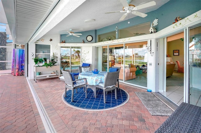 view of patio with ceiling fan and outdoor dining space