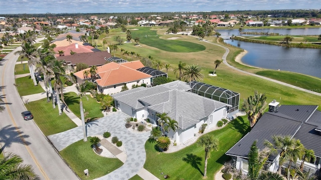 bird's eye view featuring a residential view and a water view