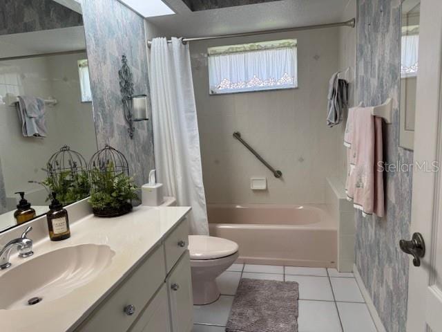 507 Monaco Dr, Punta Gorda, FL 33950 - full bathroom with tile patterned floors, shower / bath combination with curtain, toilet, and plenty of natural light