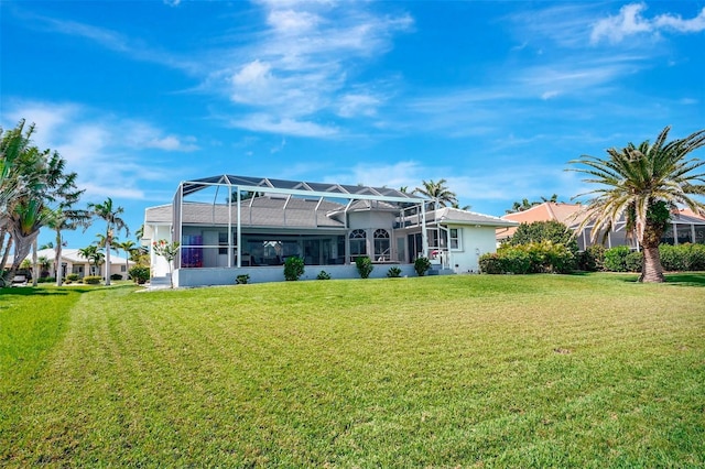 507 Monaco Dr, Punta Gorda, FL 33950 - back of house with a yard, a lanai, and stucco siding