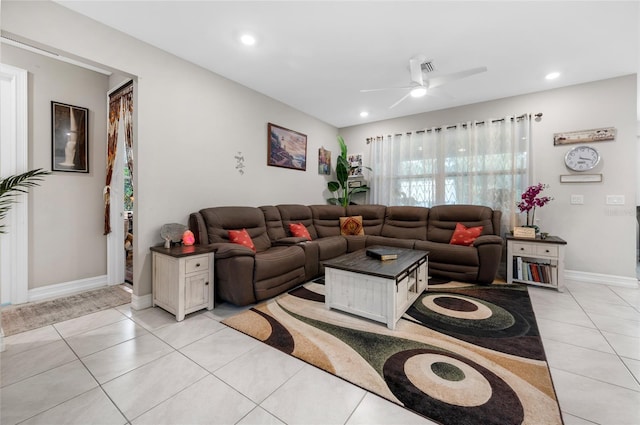 living room featuring light tile patterned floors, baseboards, a ceiling fan, and recessed lighting