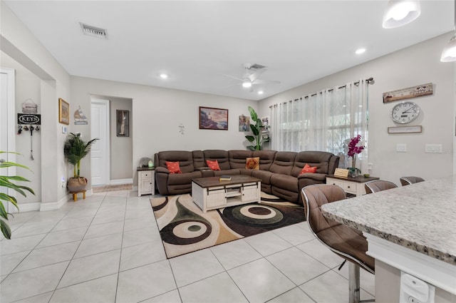 living area featuring recessed lighting, visible vents, ceiling fan, and light tile patterned floors