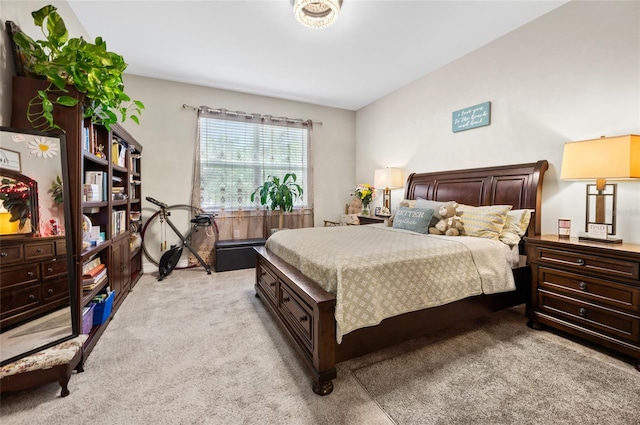 bedroom with light colored carpet