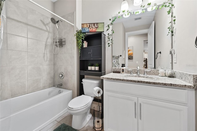 full bath featuring visible vents, toilet, vanity,  shower combination, and tile patterned floors