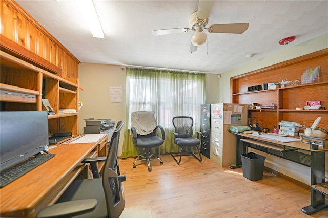 home office featuring ceiling fan and light wood-type flooring