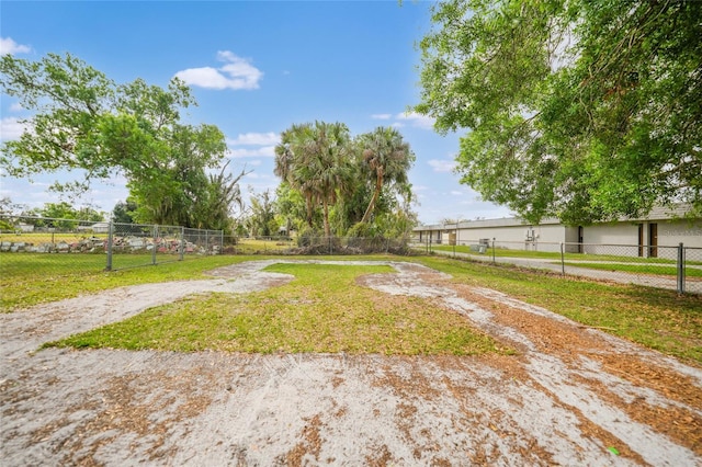 view of yard with fence