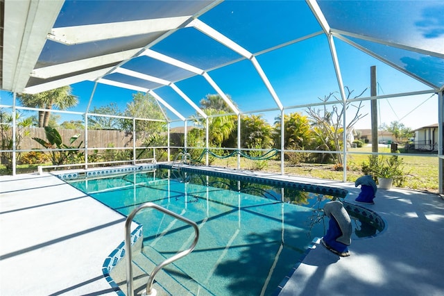 view of pool with a fenced in pool, a patio area, a lanai, and fence