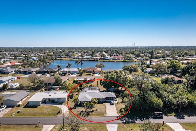 aerial view with a residential view and a water view