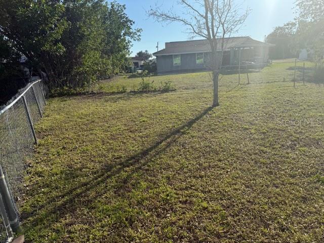 view of yard featuring fence