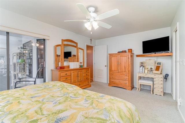 bedroom featuring baseboards, visible vents, a ceiling fan, and light colored carpet