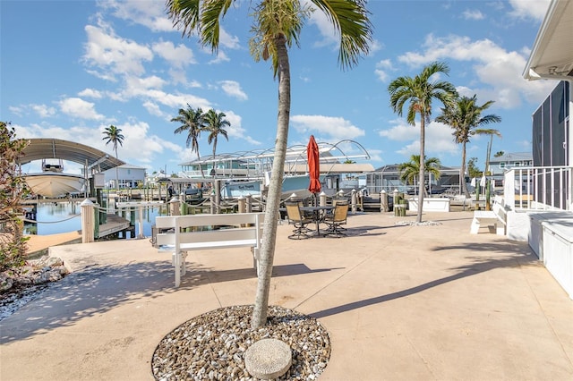 exterior space with a dock and boat lift