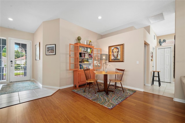 dining space featuring recessed lighting, visible vents, baseboards, and wood finished floors