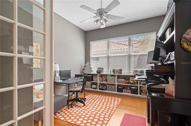 office with ceiling fan and wood finished floors