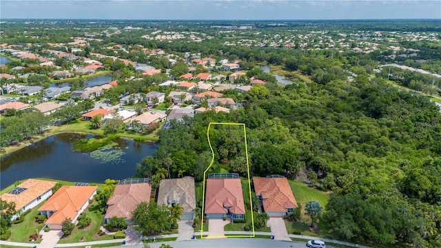 aerial view with a water view and a residential view