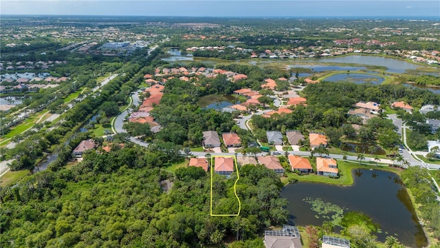 aerial view featuring a water view and a residential view