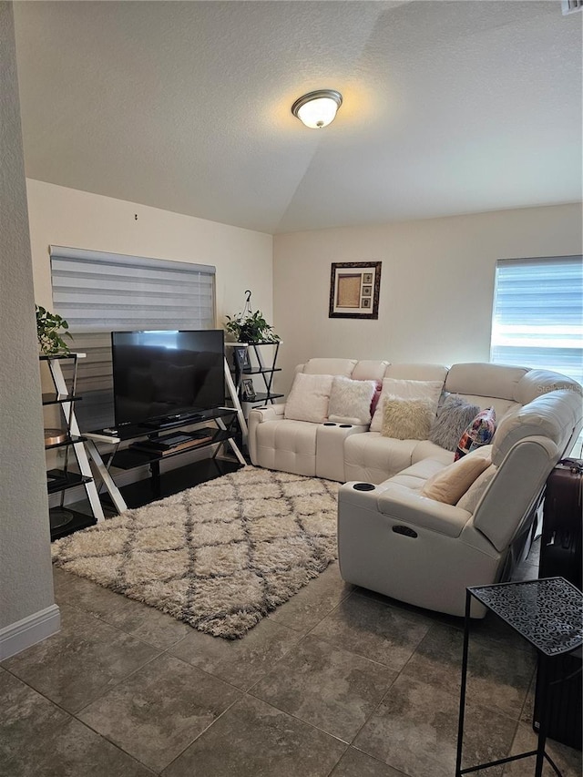 living room featuring a textured ceiling