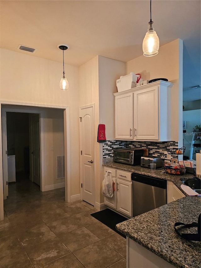 kitchen with visible vents, backsplash, dishwasher, pendant lighting, and white cabinets
