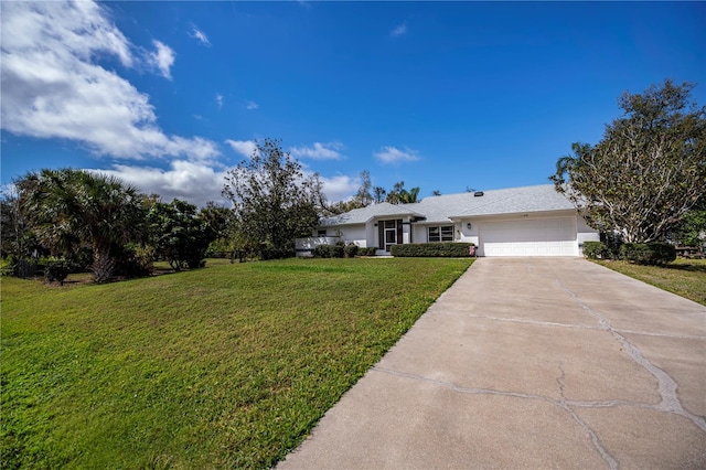 single story home featuring a garage, stucco siding, concrete driveway, and a front yard