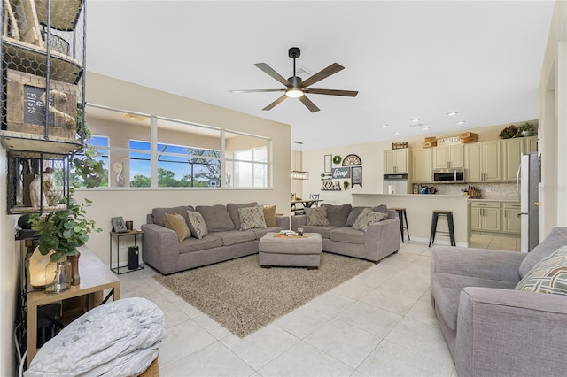 living room with recessed lighting, light tile patterned flooring, and ceiling fan