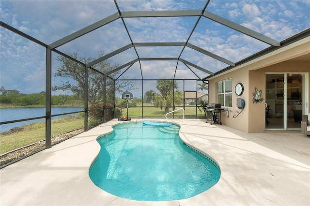 pool featuring a water view, a patio area, glass enclosure, and grilling area